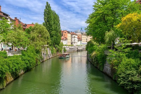 A sightseeing boat tour on the river Ljubljanica, Ljubljana, Slovenia