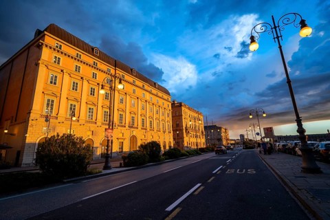 Magnificent buildings on the Riva del Mandracchio seaside promenade in the evening light at sunset,