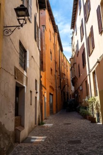 Small alley with colorful houses, old town, Bologna, Emilia Romagna, Italy
