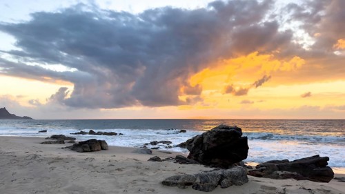 Sunrise on the beach, coast near Sadah, Oman