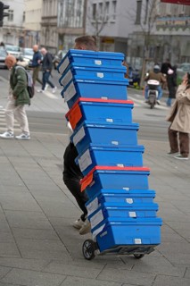 Transportation of pharmaceutical containers through the pedestrian zone, Linz, Austria