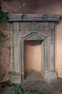 Decorative fireplace from the Renaissance period, in a historic courtyard in the old town,