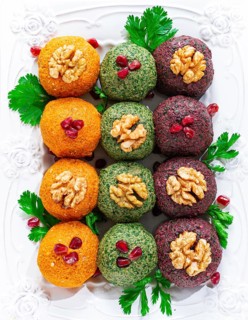 Assortment of Pkhali, pumpkin, spinach and beetroot, Georgian dish, on a white plate, appetizer