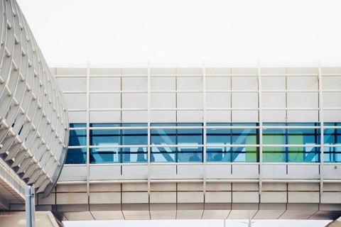 Cinematic exterior view Dubai Metro link bridge. This modern, air-conditioned pedestrian tunnel