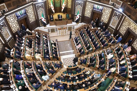 Damascus, Syria - July 12, 2026: Members of Syria's newly formed People's Assembly attend the