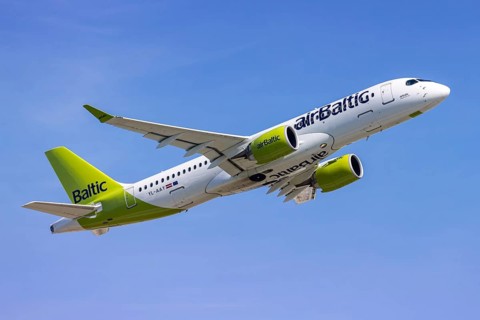 An Airbus A220-300 Air Baltic aircraft with the license plate YL-AAY at Munich Airport, Germany