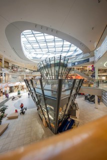 Spacious, light-filled shopping center with eye-catching glass design, Milaneo, Stuttgart, Germany