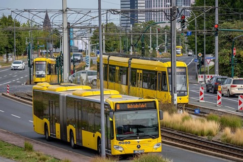 Road traffic, public transport, tram, bus, on Altendorfer Straße, in the background the town hall,