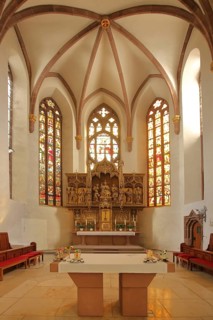 Magnificent baroque St. Lawrence church, high altar and colorful church windows, stained glass,