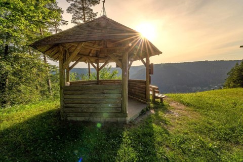 Wooden shelter with sunlight on a mountain meadow, Simmelhütte, Bad Wildbad. germany