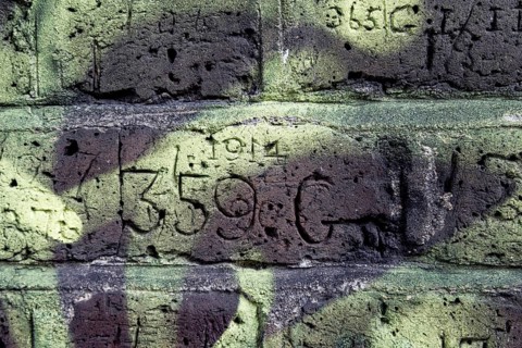 Secret London. A carved collar number reading 359 G together with the date 1914 marks a brick along