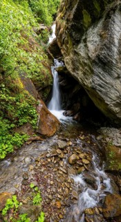 Small waterfall, Mühldorfer Bach flows through the Barbarossa Gorge, long exposure, Mölltal,