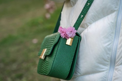 Women's green crossbody bag with pink japanese cherry blossoms (Prunus serrulata) Kanzan on the