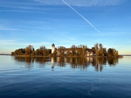 View across the lake to Fraueninsel with monastery, Frauenchiemsee, Chiemsee, Upper Bavaria,