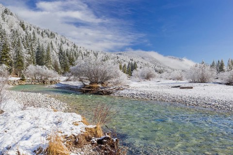 Isar valley in winter at temperatures of minus 18 degrees Celsius. Snow covered landscape with the