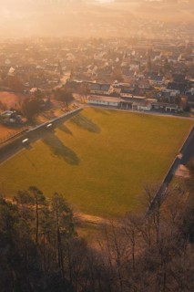 Aerial view of a soccer field with a settlement in the background, Gechingen, Calw district,