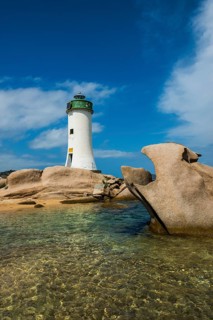 Lighthouse with beach and bizarre granite rocks, Spiaggia Porto Faro, Faro di Punta Palau, Palau,
