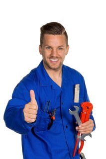 A worker in a commercial enterprise, craftsman, with tools in hand, installer, plumber Studio shot,