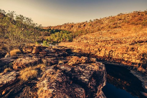 Bell Gorge waterfall, a body of water in north-west Australia in the Kimberley. Sunrise in the
