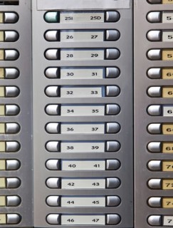 Many numbered doorbells in a residential building, Austria