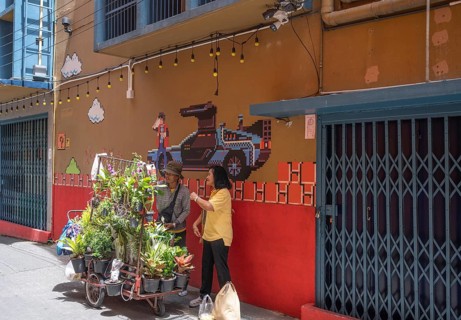 Bangkok, Thailand. August 18th 2026. A local man selling flowers and plants from a mobile cart in