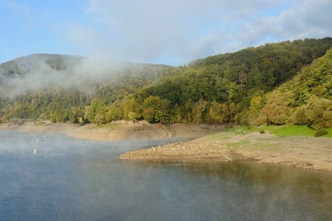 Edersee, view over the lake, rising fog, autumn, blue sky, Eder dam, Hesse, Germany