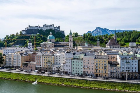 City view with churches, Hohensalzburg Fortress and Salzach river, view of the city of Salzburg