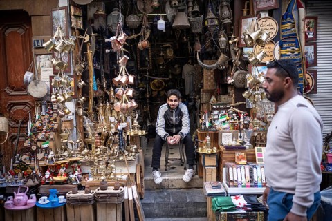 Damascus, Syria. December 4th 2025. A Syrian shop keeper selling tourist souvenirs in Qamaria