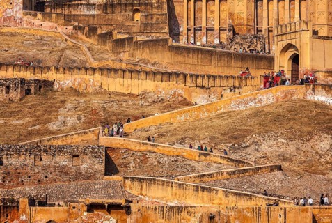 AMER, INDIA, NOVEMBER 18, 2012: Visitors ascending to Amer (Amber) fort. Amer (near Jaipur),