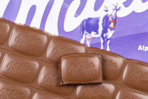 Milka chocolate bar Alpine milk chocolates with logo in Stuttgart, Germany