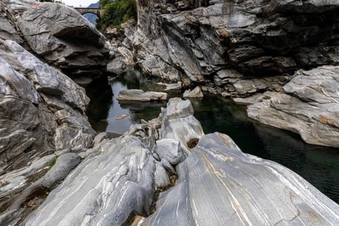 Rocks, granite rock formations in the Maggia River near Ponte Brolla, in the Maggia Valley, Valle