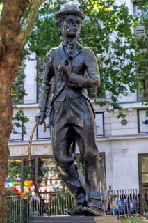 Bronze statue of Charlie Chaplin as The Tramp stands in Leicester Square, London, England, United