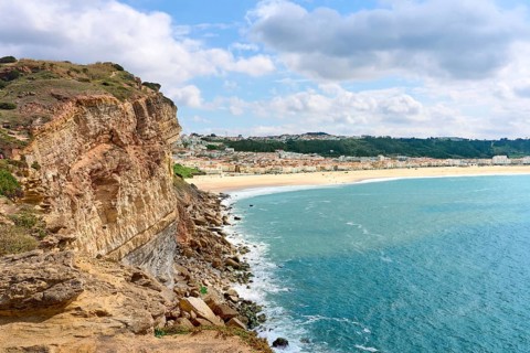 Arial view on the city of Nazare at the western atlantic ocean cost of Portugal, the citty of the