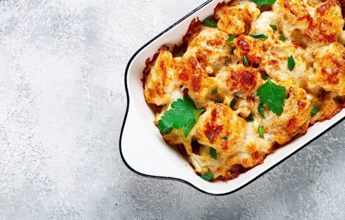 Baked cauliflower, in cream sauce, with cheese and spices, homemade, no people