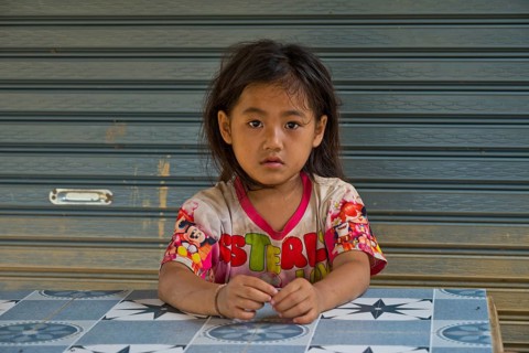 Laotian girl in a Hmong village, Pha Yung, Muang Ngoi on the Nam Ou River, Phongsali Province, Laos