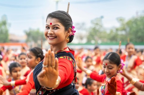 Participants with an instructor dance on the final day of a Bihu dance workshop ahead of Rongali