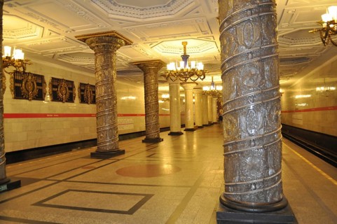 Artistically designed subway station with decorative columns and bright lighting, metro, Saint