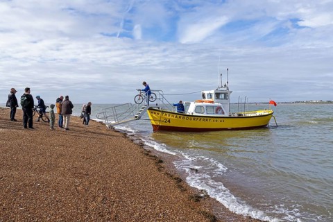 People, bikes, harbour ferry, beach, Felixstowe, England, Great Britain