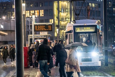 Full tram stop Schadowstraße, rainy weather, Düsseldorf, North Rhine-Westphalia, Germany