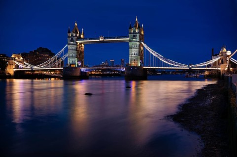 Night view, Thames, Tower Bridge, illuminated, behind Canary Wharf, blue hour, dusk, London,