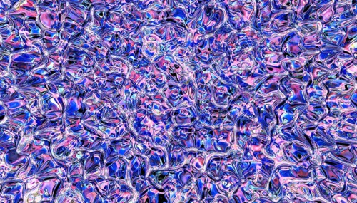 Mesmerizing abstract texture with swirling patterns in shades of blue and pink. The glass-like