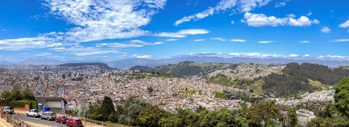 Skyline panoramic view of historic center in Quito, Ecuador from lookout of Virgin of Panecillo