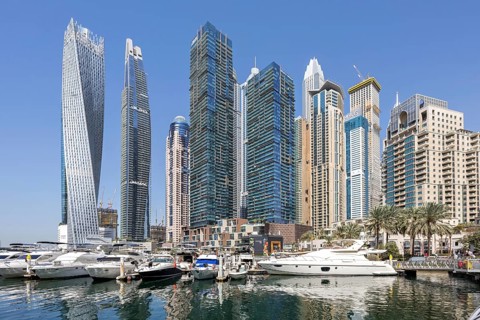 Dubai Marina Skyline Skyscrapers with Yachts Skyscrapers live on the waterfront in Dubai, United