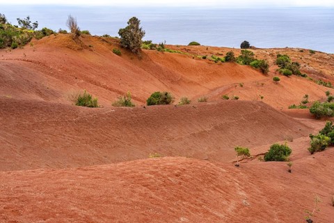 Landscape with red earth at the Mirador de Abrante near Agulo, La Gomera, Canary Islands, Spain