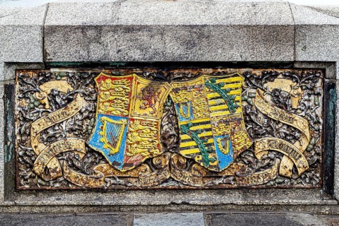 A brightly enamelled coat of arms panel forms part of the Victorian ornamentation on Westminster