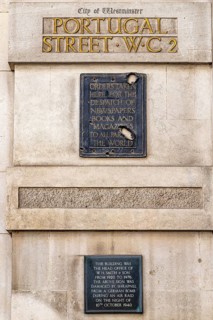 Two bronze plaques on Portugal Street mark the former head office of W H Smith and Son, which