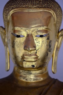 Gilded Buddha statue in Wat Pho, Temple of the Reclining Buddha, Bangkok, Thailand