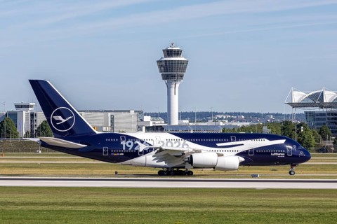 A Lufthansa Airbus A380-800 aircraft with the D-AIMH license plate and the 100 years of Lufthansa