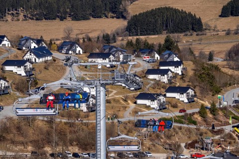 Winter sports area in the Sauerland, Winterberg ski lift carousel, artificial snow slopes,