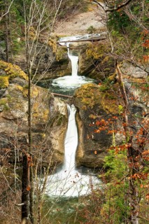 The Buchenegg waterfalls, surrounded by rocks. Autumn. Oberstaufen, Upper Allgäu, Bavaria, Germany